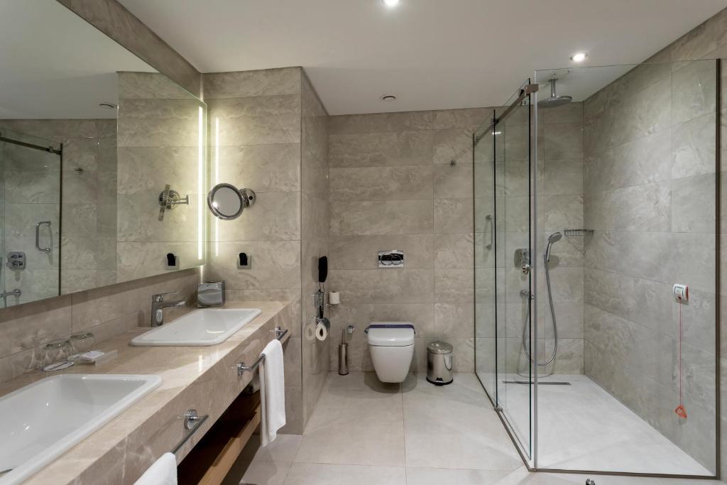 luxury suite with spa bath and panoramic sea view