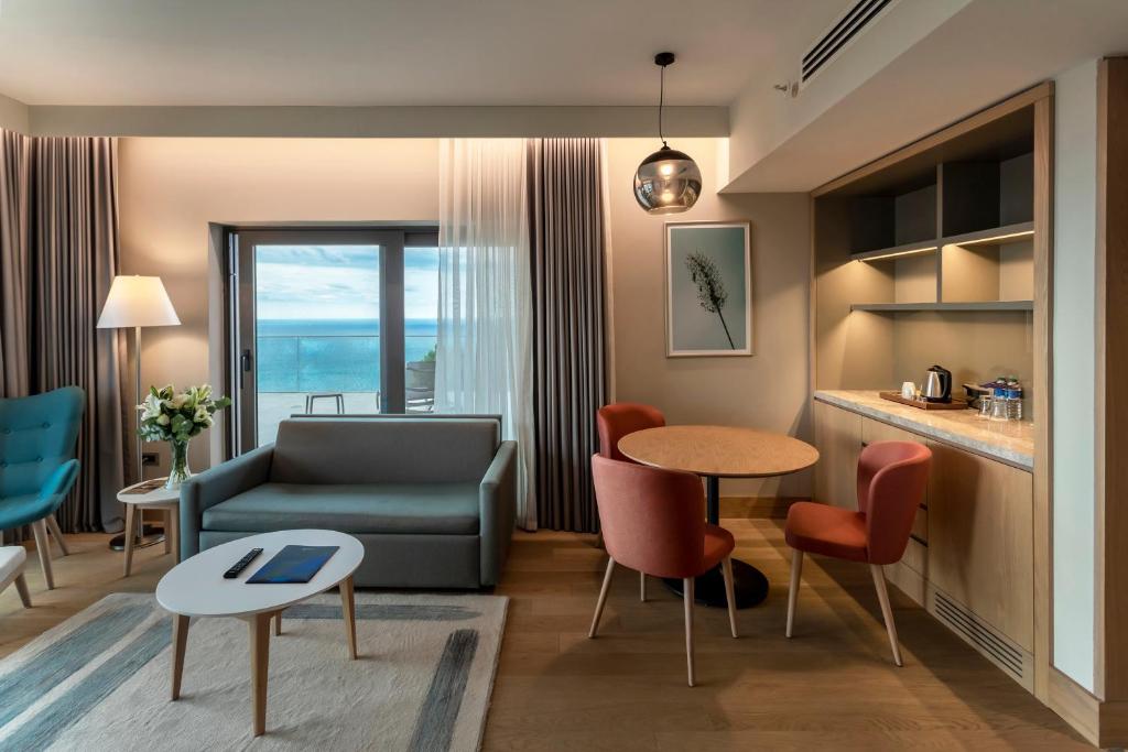 luxury suite with spa bath and panoramic sea view