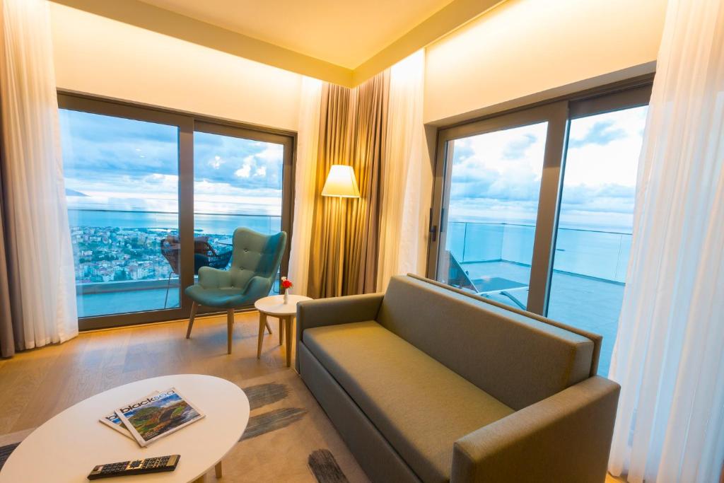 luxury suite with spa bath and panoramic sea view