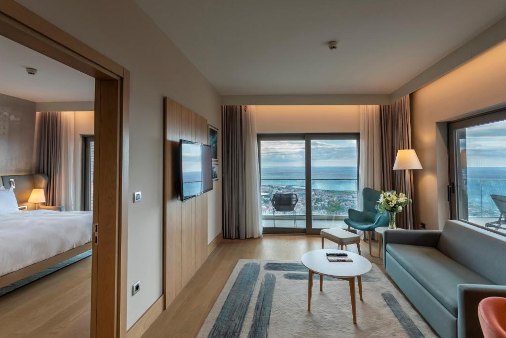 luxury suite with spa bath and panoramic sea view
