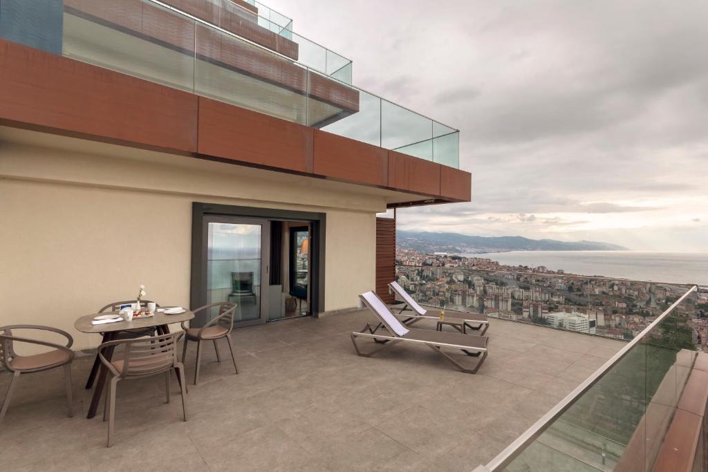 luxury suite with spa bath and panoramic sea view